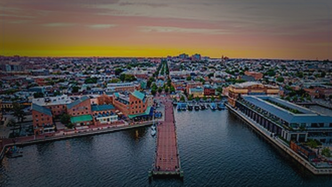 Baltimore skyline themed Pine Script service cover with dark market grading