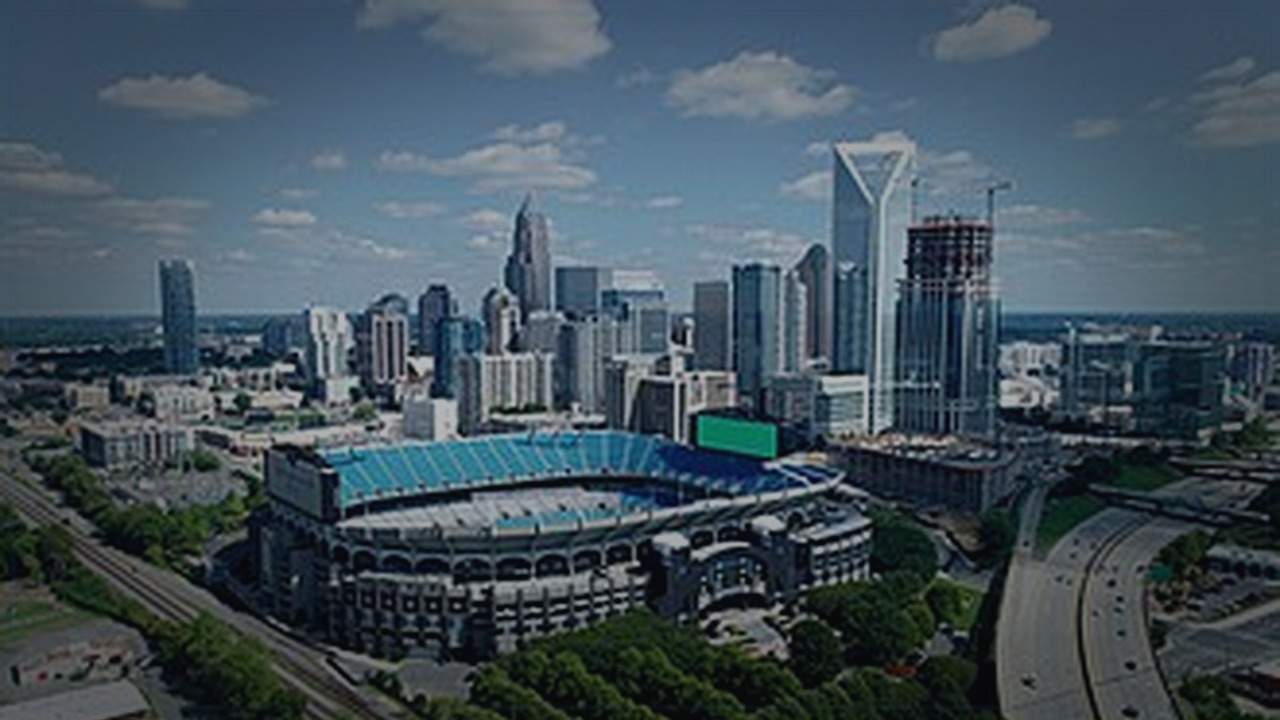 Charlotte skyline themed Pine Script service cover with dark market grading