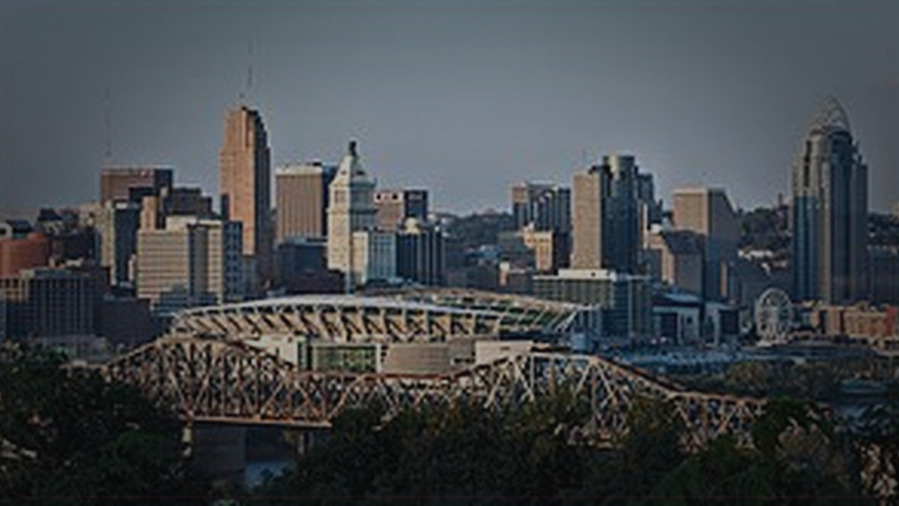 Cincinnati skyline themed Pine Script service cover with dark market grading
