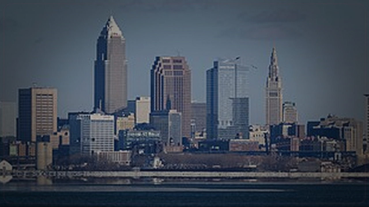 Cleveland skyline themed Pine Script service cover with dark market grading