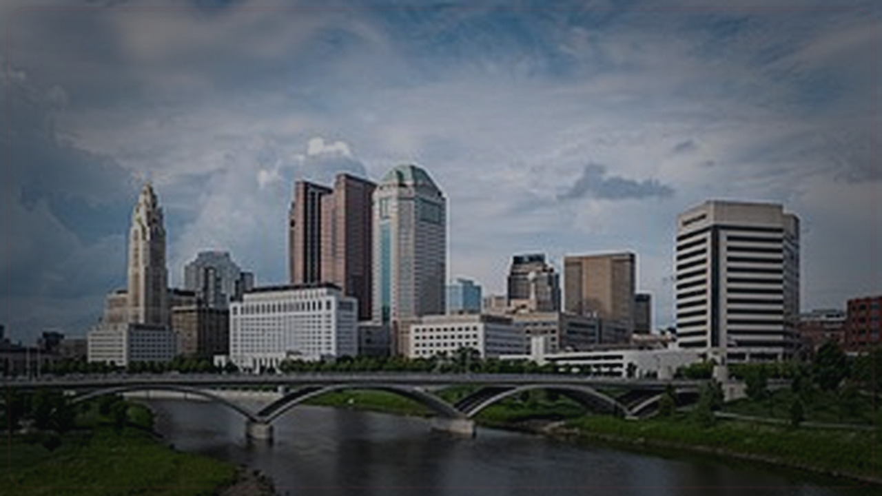 Columbus skyline themed Pine Script service cover with dark market grading