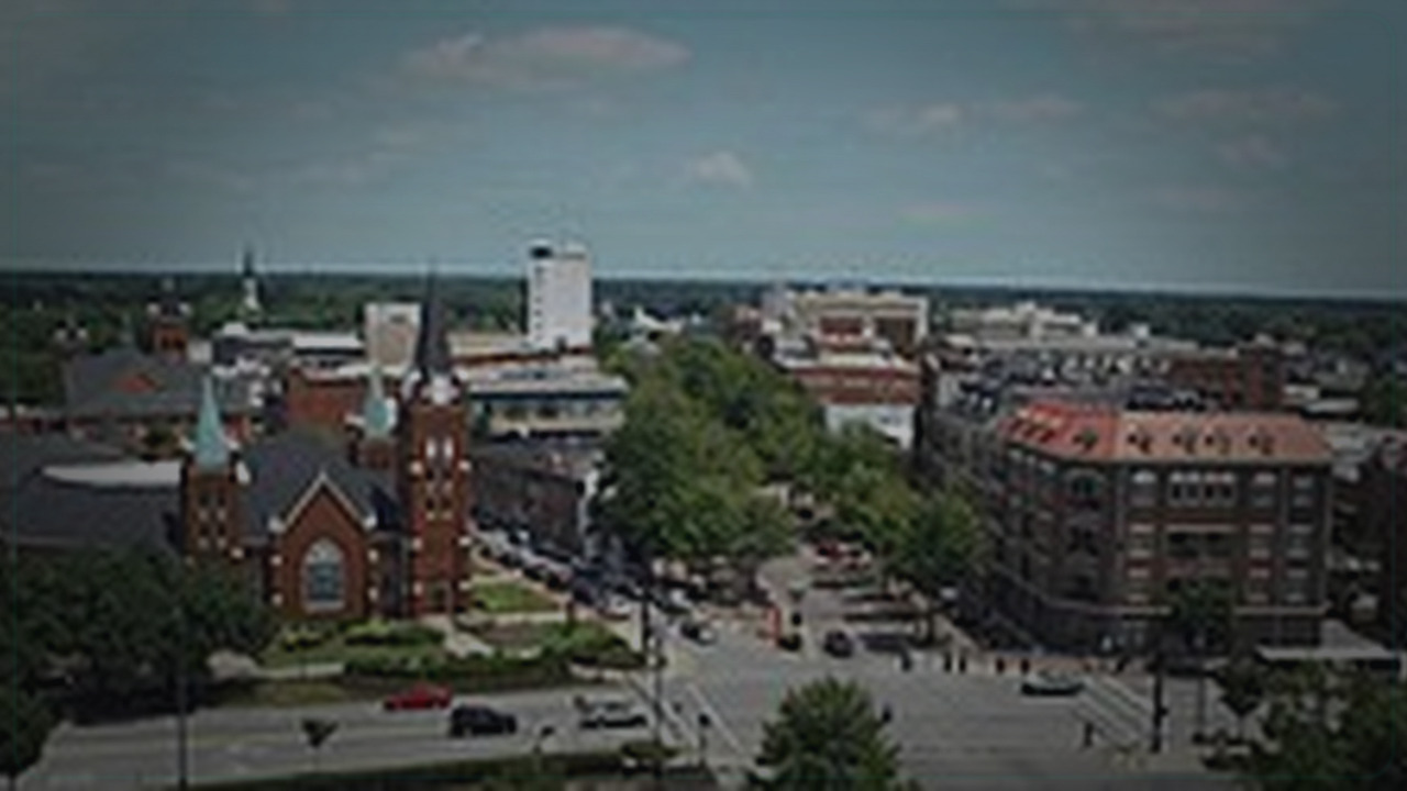 Fayetteville skyline themed Pine Script service cover with dark market grading