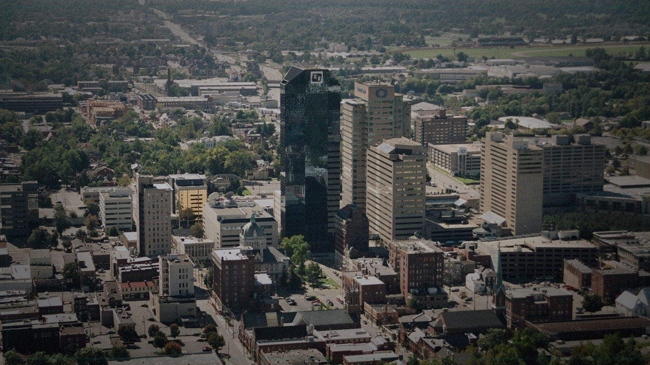 Lexington skyline themed Pine Script service cover with dark market grading