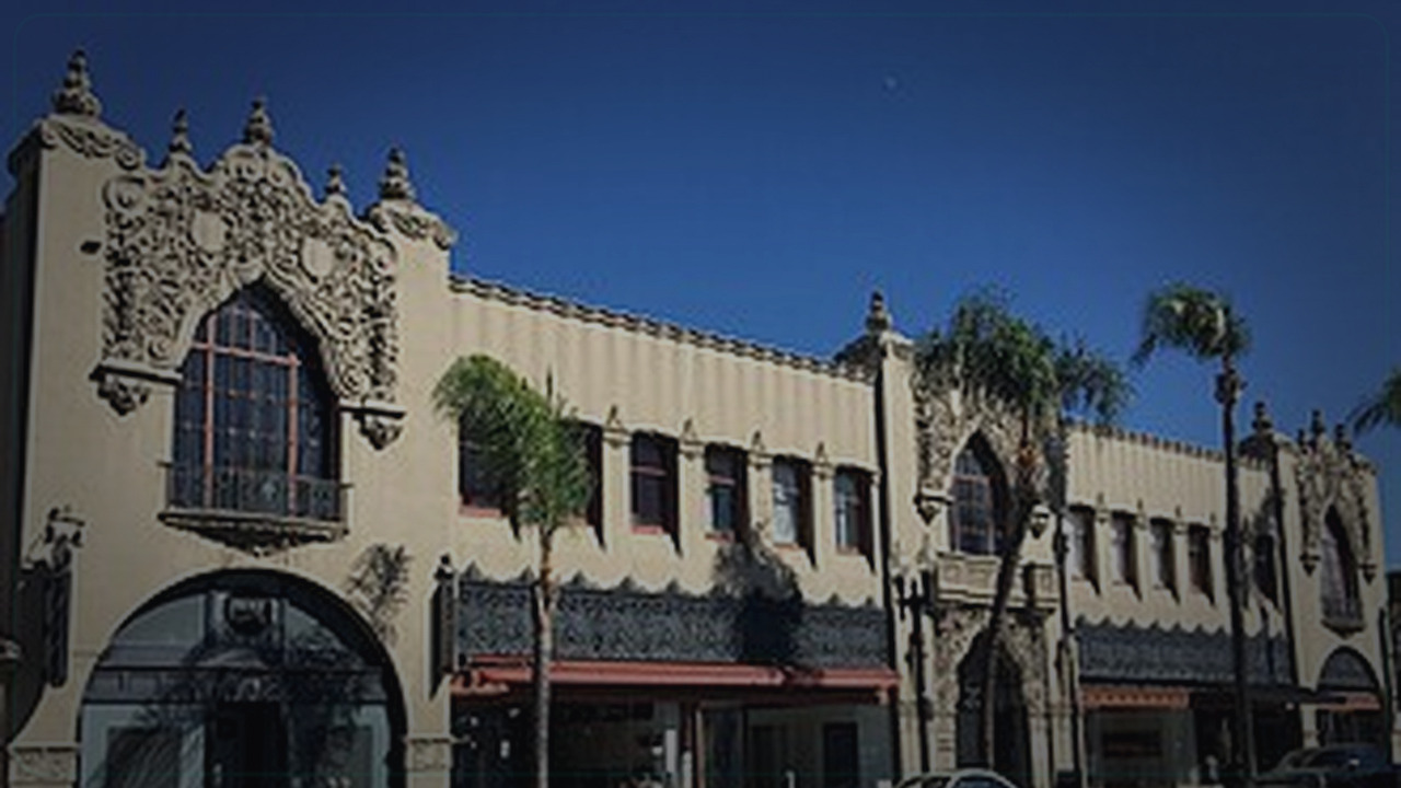 Santa Ana skyline themed Pine Script service cover with dark market grading