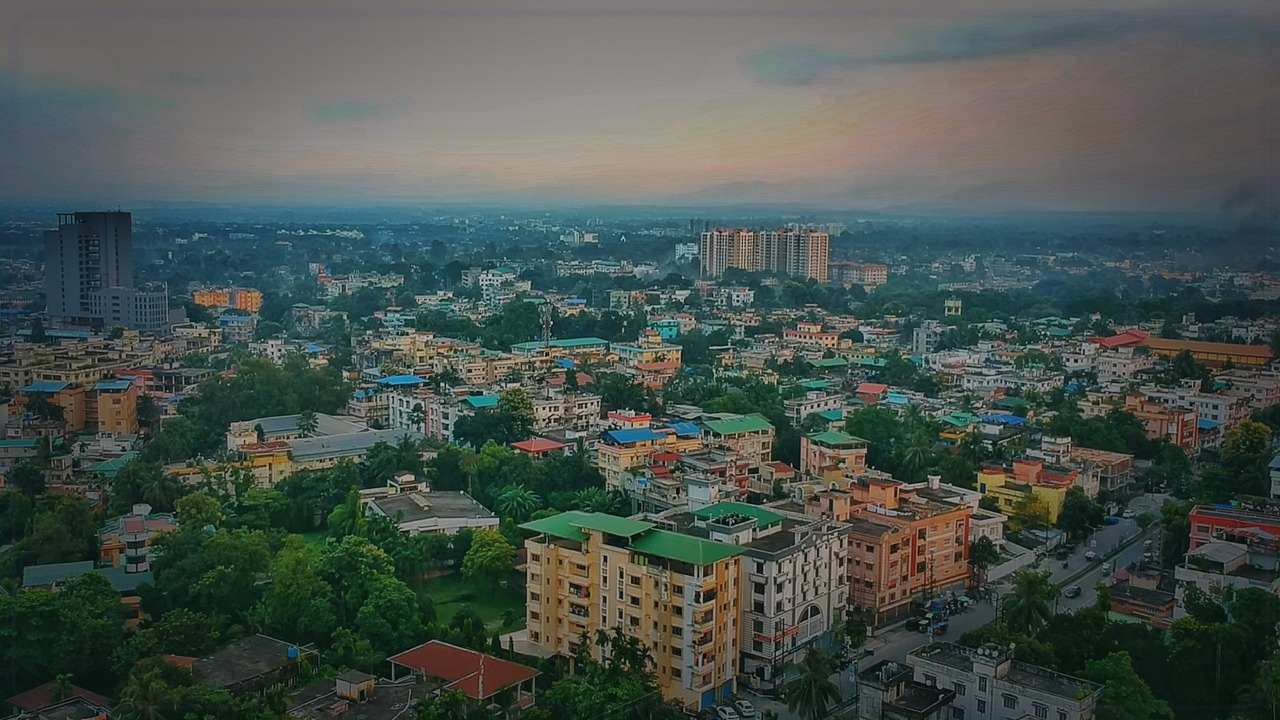 Siliguri India skyline themed Pine Script service cover with dark market grading